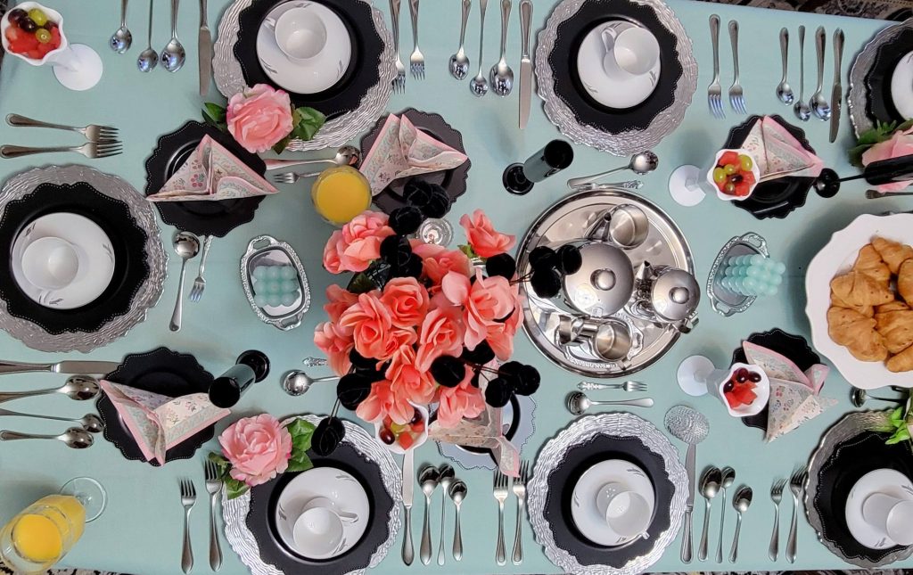 Brunch table · mint and coral, overhead · 19 January 2026