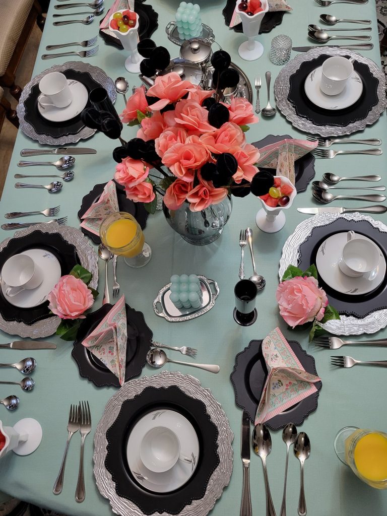 Brunch table · mint and coral, overhead · 19 January 2026