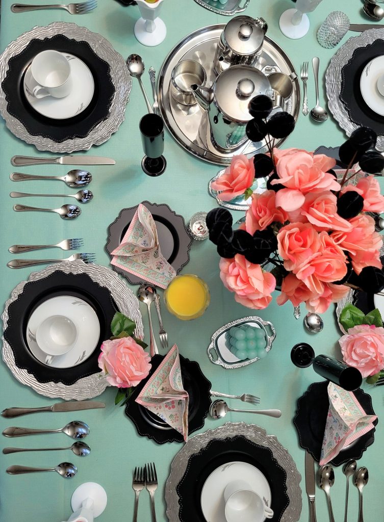 Brunch table · mint and coral, overhead · 19 January 2026