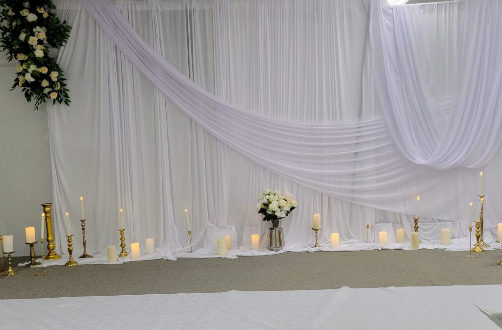 Wedding · navy and gold, rose wall · 27 March 2026