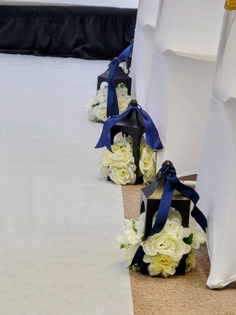 Wedding · navy and gold, rose wall · 27 March 2026