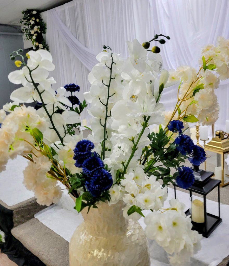 Wedding · navy and gold, rose wall · 27 March 2026