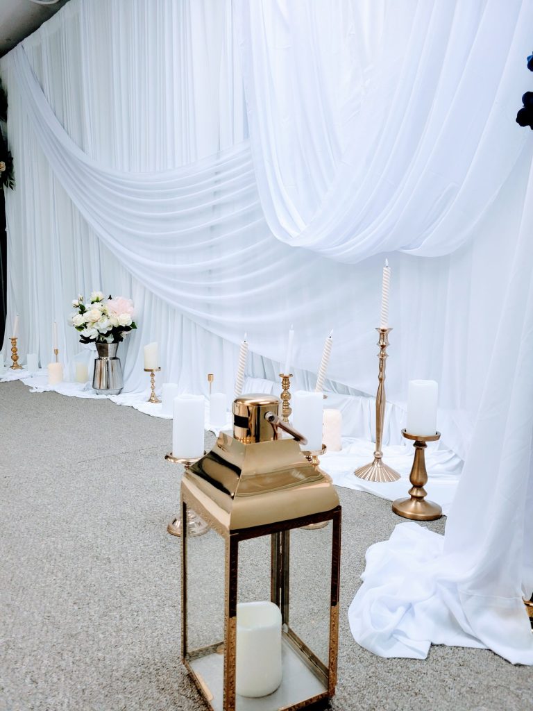 Wedding · navy and gold, rose wall · 27 March 2026