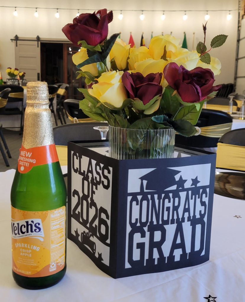 Graduation · black and gold, brick venue · 8 May 2026